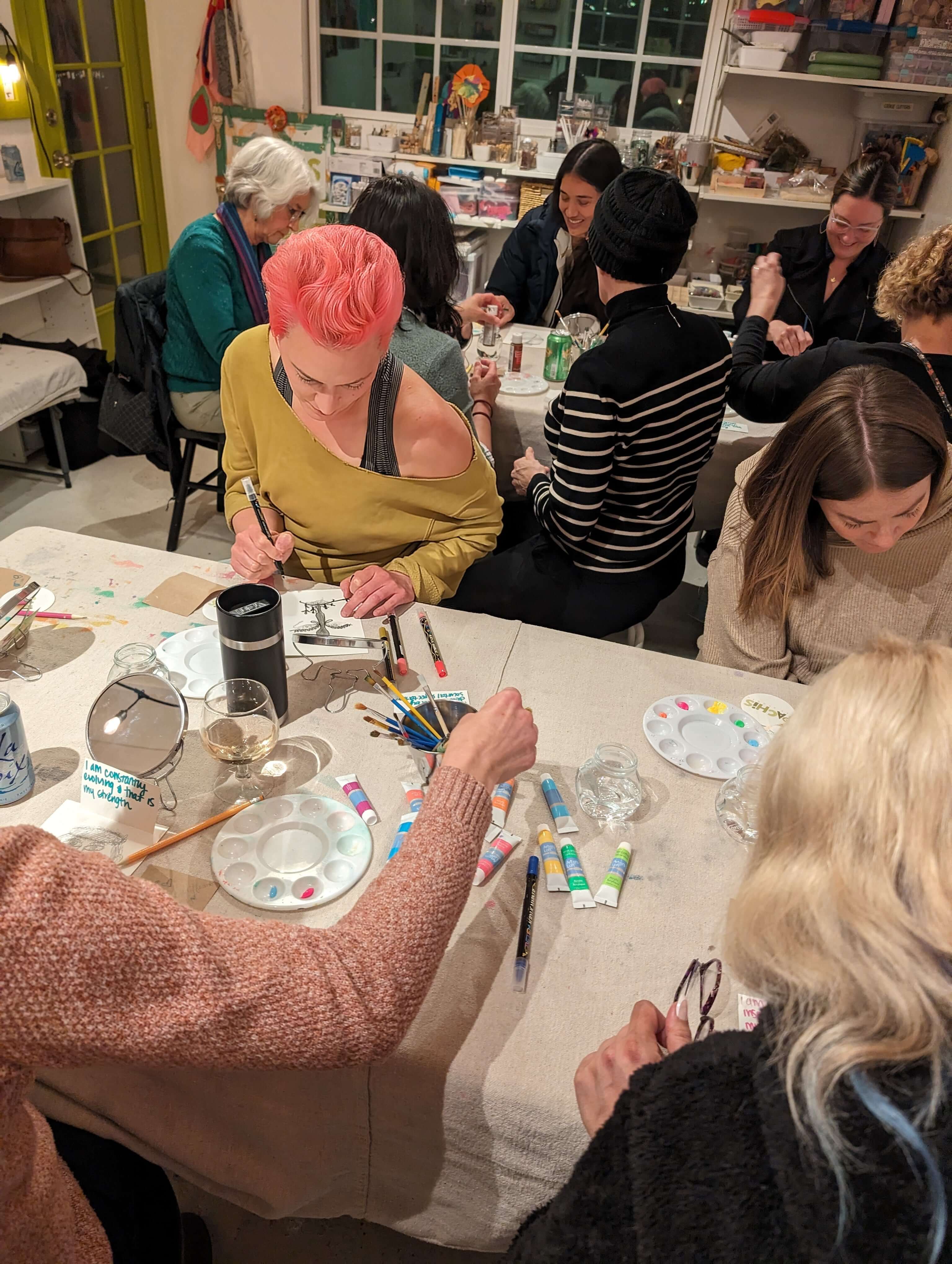 Women in a creative wellness art session at Pachis art studio in Linda Vista, San Diego