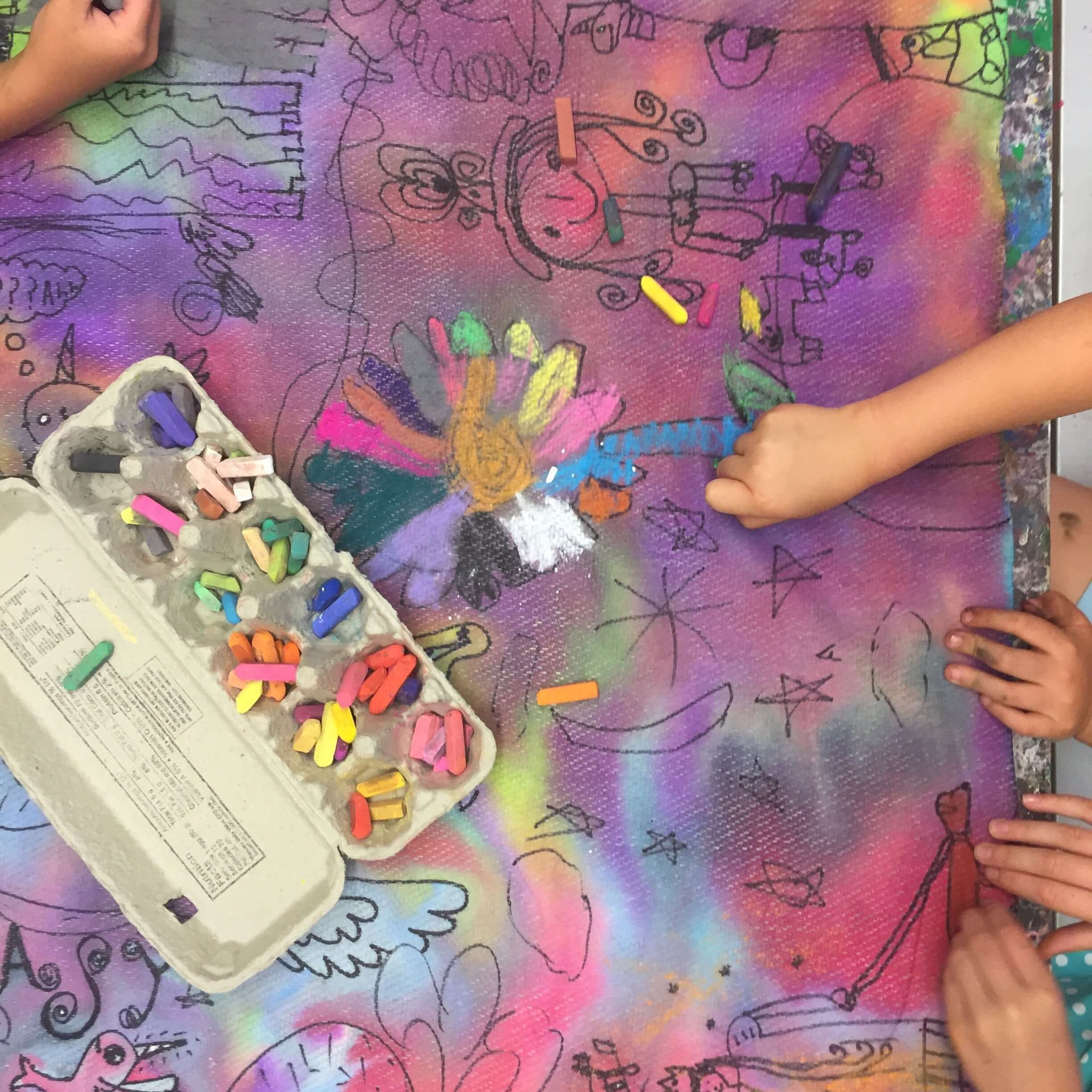 Tweens and teens in an outdoor art class at Pachis art studio in Linda Vista, San Diego